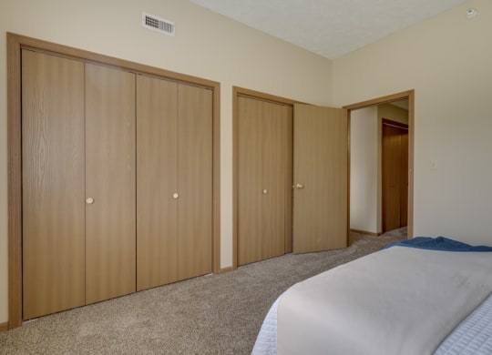 Two closets in the bedroom for storage at Pine Lake Heights apartments