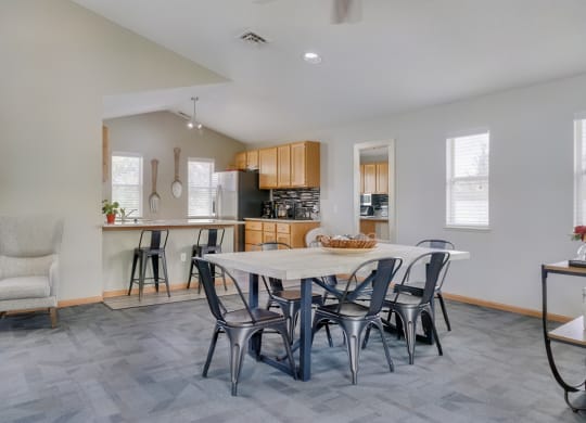 Dining space and community kitchen in the clubhouse at Skyline View apartments