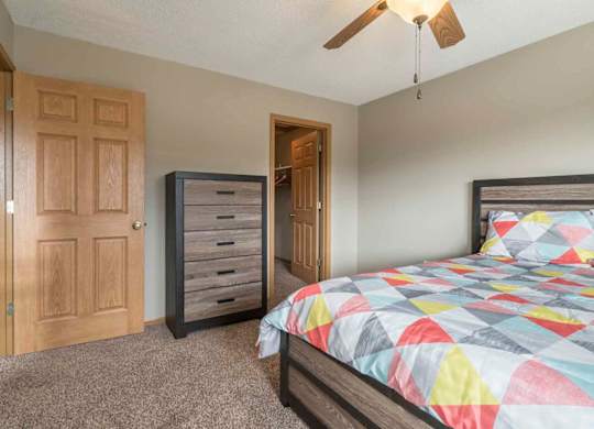 Second bedroom with walk-in closet at Southwind Villas in southwest Omaha in La Vista, NE, 68128