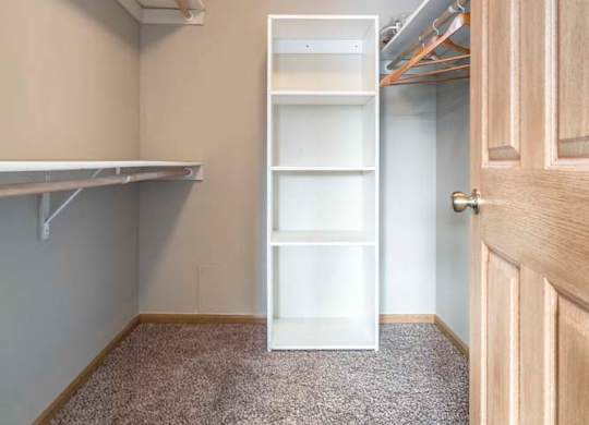 Large walk-in closet with shelving at Southwind Villas in southwest Omaha in La Vista, NE, 68128