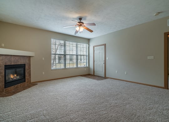 Spacious Large Living Room with Fireplace at Stone Creek Villas Apartments in Omaha Nebraska