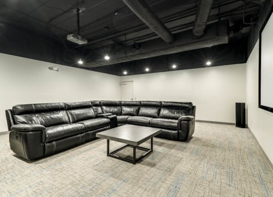 Movie theater room with sectional couch at Stone Creek Villas townhomes in west Omaha NE 68116