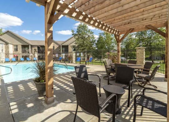 Pergola next to outdoor pool at Stone Creek Villas townhomes in west Omaha NE 68116