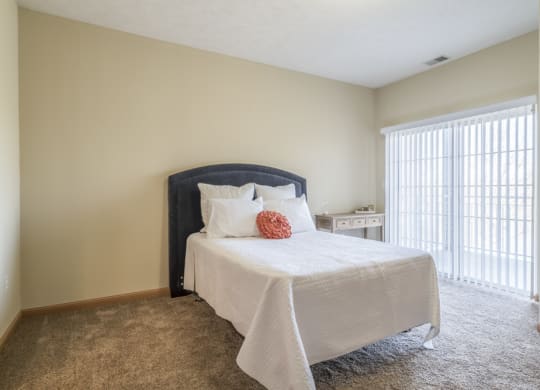 bedroom with bed and window