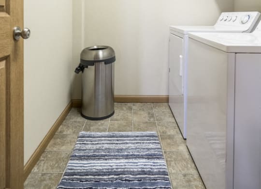 Separate laundry room with full-size washer and dryer included at Stone Ridge townhomes in south Lincoln NE