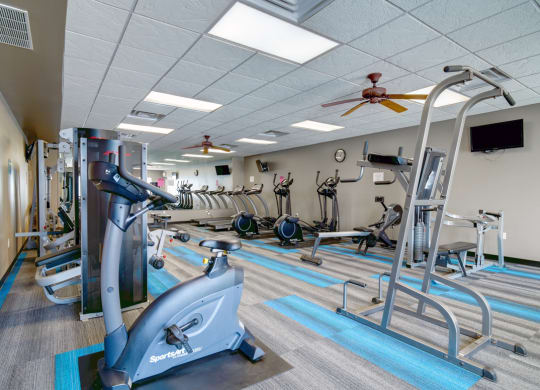 Expansive fitness center includes free weights, cardio and weigh machines
