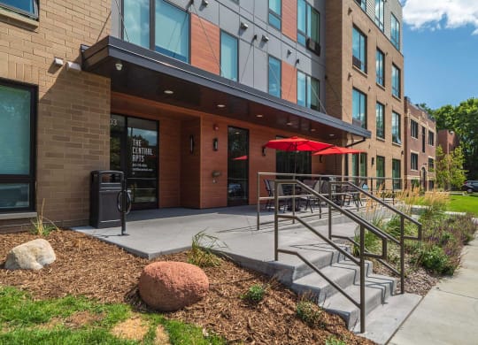 Entrance and patio of The Central apartments near uptown and downtown Minneapolis MN