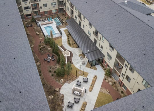 Courtyard with pool at The Conrad apartments in Blackstone District Omaha NE