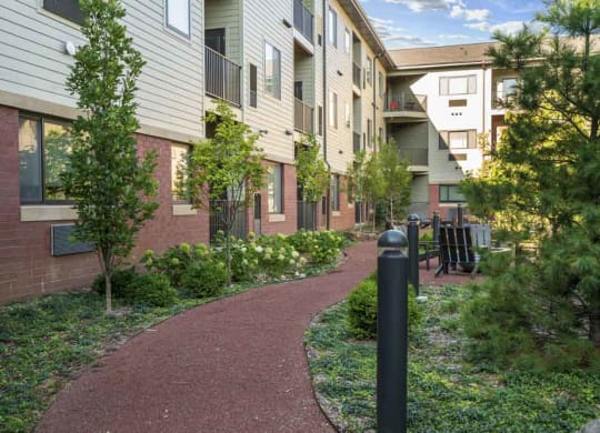Walking path in the pocket park at The Conrad near UNMC in the Blackstone District Omaha NE 68105