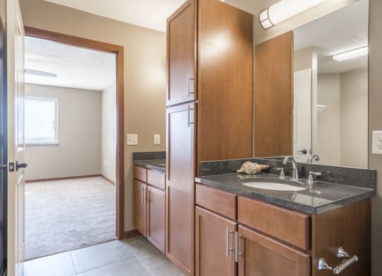 Bathroom granite countertops at The Flats at 84 in southeast Lincoln NE 68516