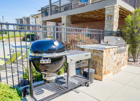 community bbq grill in front of the community clubhouse