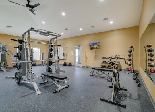 Weight lifting equipment in the fitness center at The Flats at Shadow Creek
