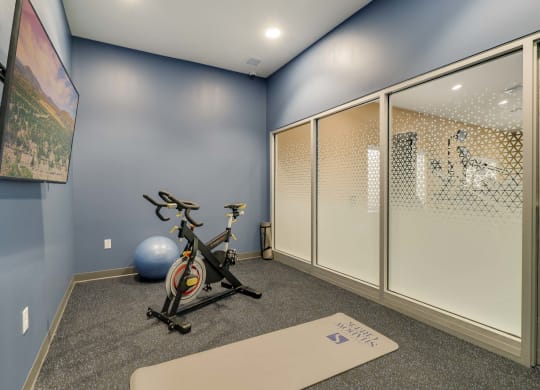 Private yoga and cycling studio at The Flats at Shadow Creek new luxury apartments in east Lincoln NE 68520