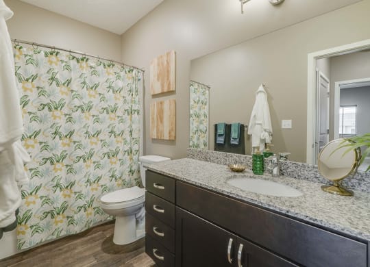 Large bathroom with granite countertop at The Flats at Shadow Creek new luxury apartments in east Lincoln NE 68520