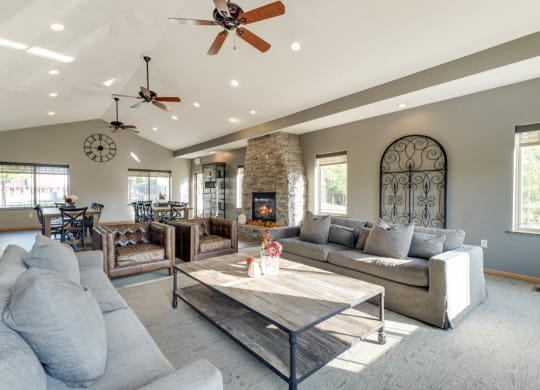 Clubhouse with social spaces and comfortable couches at Grand Legacy apartments and townhomes in west Omaha NE 68130