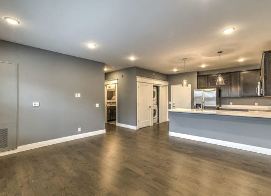 Open floorplan living room and kitchen space at The Helen