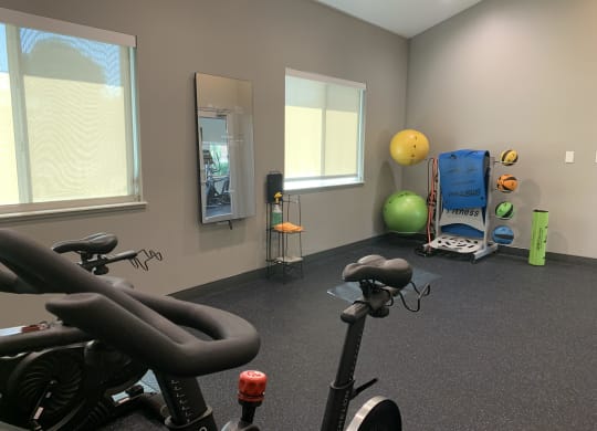 24 hour fitness center with yoga and spin studio at the northbrook apartments in lincoln nebraska
