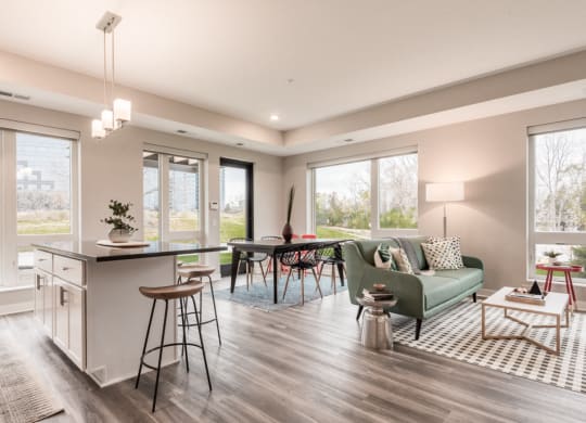 Interiors- Kitchen Island and Living Room View at The Preserve at Normandale Lake