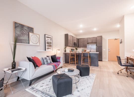 Interiors- Living room and kitchen view at The Preserve at Normandale Lake in Bloomington, MN