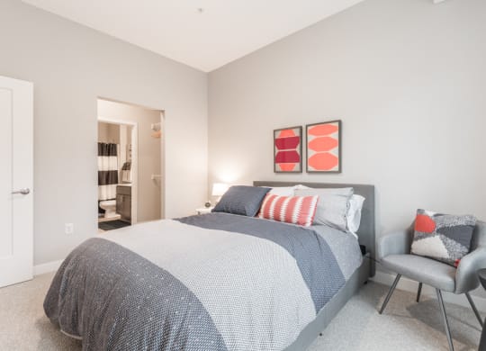 Interiors- Large bedroom with natural light at The Preserve at Normandale Lake in Bloomington, MN
