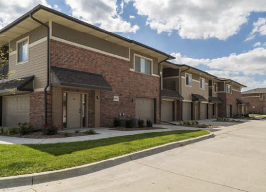Private entrances and attached garages at The Villas at Falling Waters in west Omaha, NE