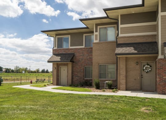 Private entrances with greenspace at The Villas at Falling Waters townhomes in West Omaha NE