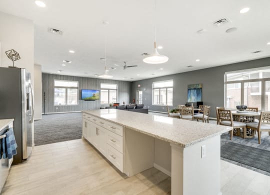 Resident clubhouse with kitchen and TV lounge at The Villas at Falling Waters townhomes in west Omaha NE