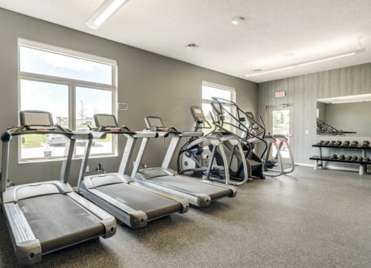 Treadmills and stair climbers in the fitness center at The Villas at Falling Waters in west Omaha