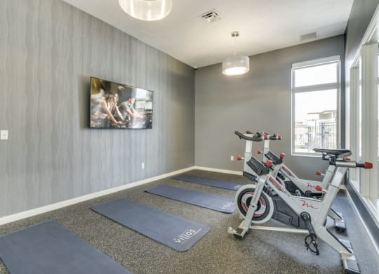 Yoga/spin studio at The Villas at Falling Waters luxury townhomes for rent in west Omaha NE