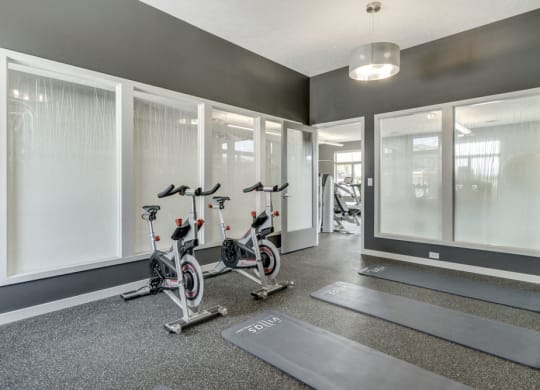 Yoga/spin studio at The Villas at Falling Waters luxury townhomes for rent in west Omaha NE