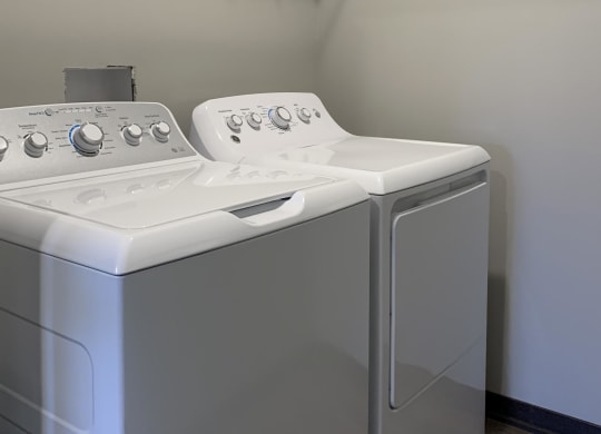 Washer and dryer laundry room at the villas at mahoney park