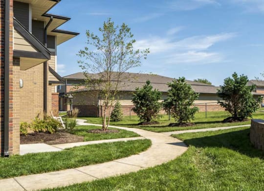 Walk paths and green space at The Villas at Mahoney Park
