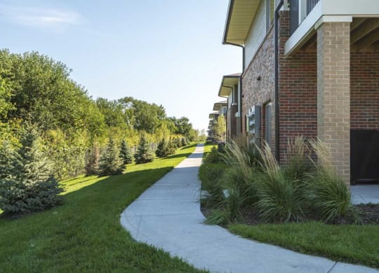 Walking paths leading to the buildings at The Villas at Mahoney Park