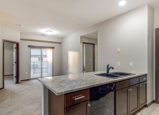 The kitchen in the Ash features a peninsula counter with room for seating.
