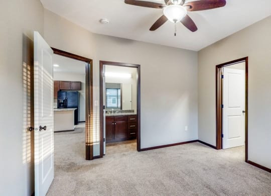 Spacious master bedroom in the Ash at The Villas at Wilderness Ridge luxury apartments in southwest Lincoln NE 68512