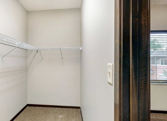 Walk in closet in the Ash 2 bedroom at The Villas at Wilderness Ridge luxury apartments in southwest Lincoln NE 68512