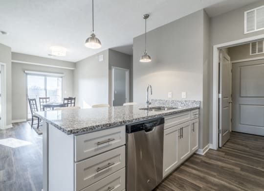 Kitchen with pendant lighting at The Villas at Mahoney Park