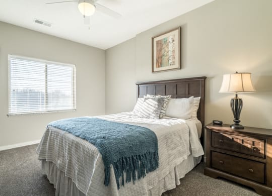 Spacious bedroom with lots of natural lighting at The Villas at Mahoney Park