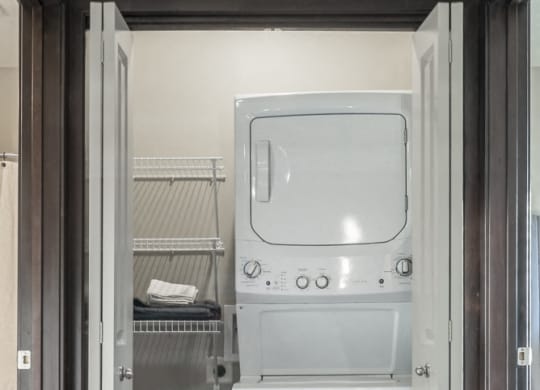 Stackable or full size washer and dryer included in unit at The Villa at Mahoney Park