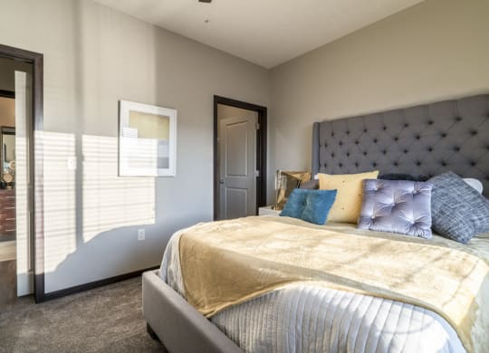 Spacious bedroom large enough to include a king sized bed at The Villas at Mahoney Park