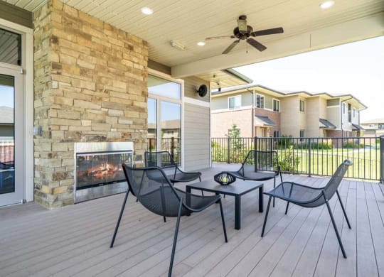 Outdoor fireplace with seating at Villas of Omaha in northwest Omaha NE 68116