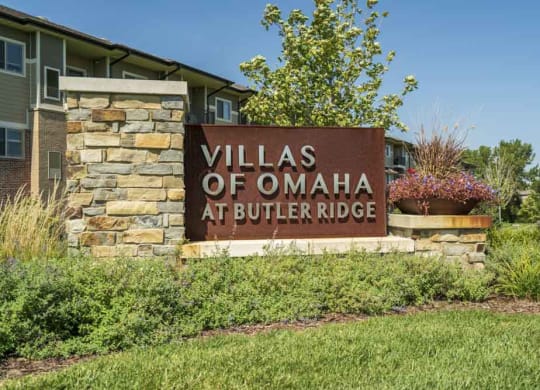 Entrance sign at Villas of Omaha townhome apartments in northwest Omaha NE 68116