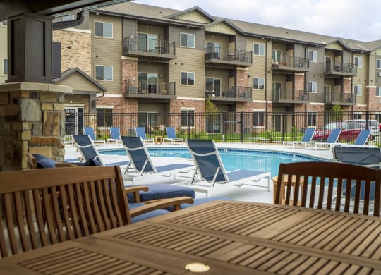 Exteriors - Relaxing patio, Luxury pool and hot tub view of WH Flats new luxury apartments in south Lincoln NE 68516