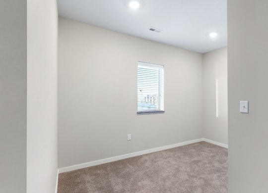 The den area in the 2 bedroom Marigold with den floor plan is perfect for a desk or reading nook.