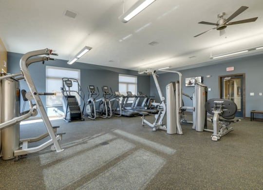 WH Flats apartments' expansive gym with cardio and weightlifting equipment in south Lincoln NE