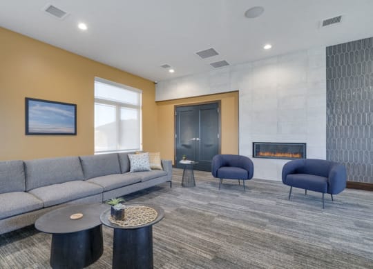 Resident lounge with fireplace and seating at WH Flats luxury apartments in south Lincoln NE