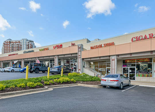 A cigarette store is located in a strip mall.