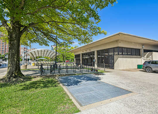A building with a parking lot in front of it.