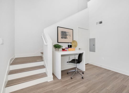 Woodland Hills, CA Lofts for Rent - The Q Variel - Home Office Space by the Stairs with High Ceilings and Luxury Wood Plank Style Flooring