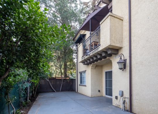 a view of the back of the house from the driveway at The Village Apartments, Van Nuys, CA